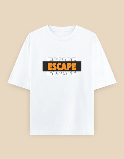 White oversized t-shirt featuring a bold layered "ESCAPE" typography graphic in orange, black, and white on the front.