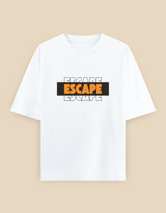 White oversized t-shirt featuring a bold layered "ESCAPE" typography graphic in orange, black, and white on the front.