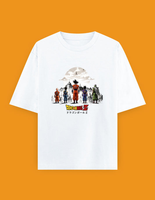 White oversized t-shirt featuring an anime-inspired team of legendary martial warriors standing together with a scenic monochrome background and colorful graphic artwork printed on the front.