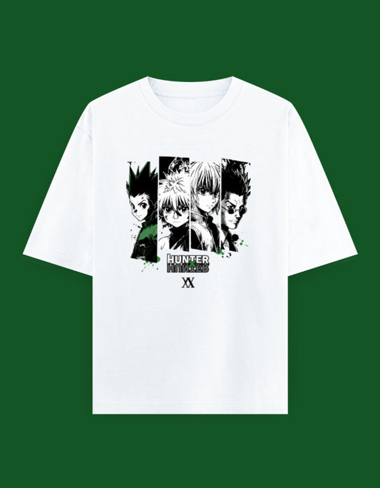 White oversized t-shirt featuring an anime-inspired character collage with green accents printed on the front.