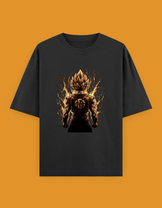 Black oversized t-shirt featuring a powerful anime-inspired warrior with glowing golden energy and a bold graphic printed on the front.
