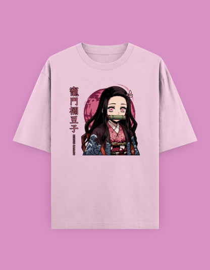 Pastel pink oversized t-shirt featuring a cute anime-inspired character with Japanese typography printed on the front.