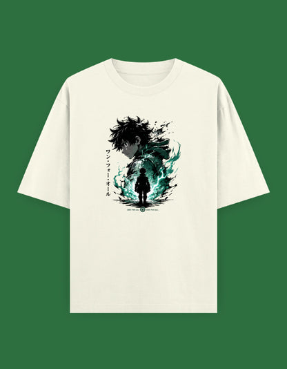 Off-white oversized t-shirt featuring an anime-inspired hero illustration with emerald green energy effects, Japanese typography, and premium streetwear styling.
