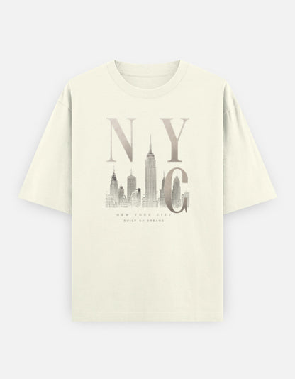 Off-white oversized t-shirt featuring a minimalist New York City skyline illustration with bold NYC typography printed on the front.