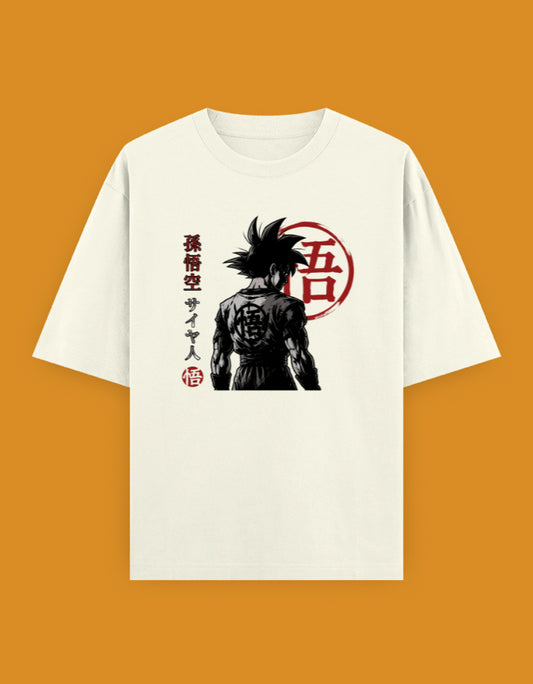 White oversized t-shirt featuring a monochrome anime-inspired Saiyan warrior illustration with red Japanese typography and minimalist streetwear styling.jpg