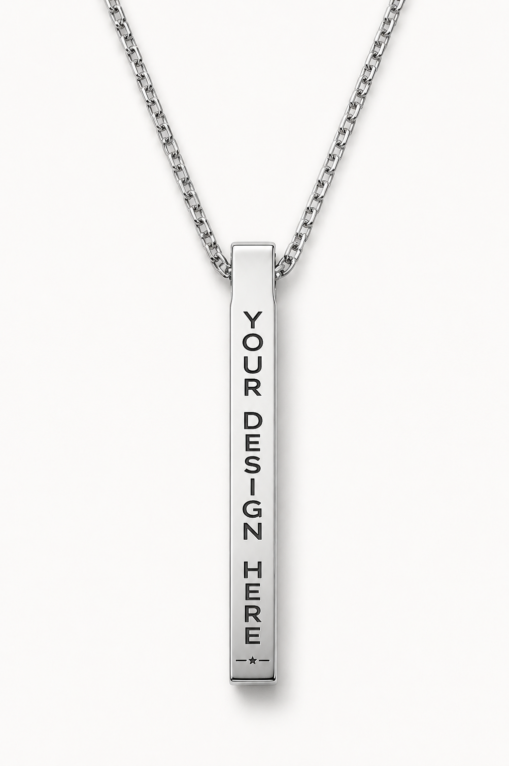 A silver vertical bar necklace with a chain, featuring the text 'YOUR DESIGN HERE' printed vertically in black on the bar, set against a light gray background.