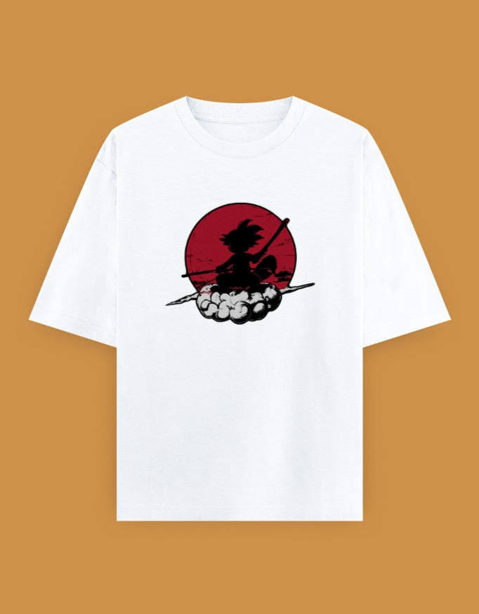Kid Goku riding Flying Nimbus with Power Pole on an oversized unisex Dragon Ball T-shirt