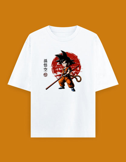 Kid Goku holding the Power Pole with Japanese 孫悟空 typography on an oversized unisex Dragon Ball T-shirt